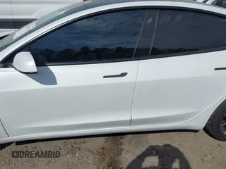 2022 Tesla Model 3 with VIN 5YJ3E1EA5NF124148, listed as a IAAI auction lot 41908884 with 45,115 mi miles. Bid and sale history available at carsss.com. Image 15.