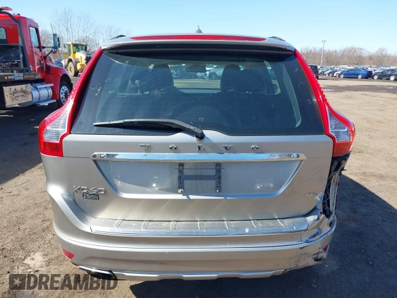2015 Volvo XC60 z VIN YV4940RAXF2612546, wystawiony jako IAAI lot #41787624 z przebiegiem 92 452 mil mil oraz . Historia ofert i sprzedaży dostępna na DreamBid. Obrazek 16.