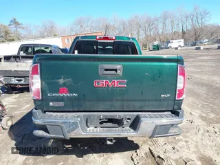 2015 GMC Canyon 4WD SLT with VIN 1GTG6CE35F1273343, listed as a IAAI auction lot 41683758 with 77,911 mi miles. Bid and sale history available at carsss.com. Image 16.