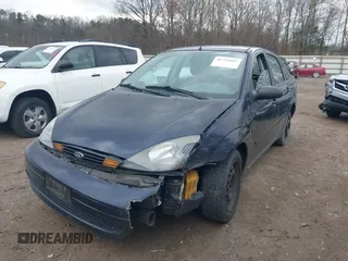 2004 Ford Focus SE with VIN 1FAFP34Z04W169203, listed as a IAAI auction lot 41715587 with 195,833 mi miles and . Bid and sale history available at DreamBid. Image 2.