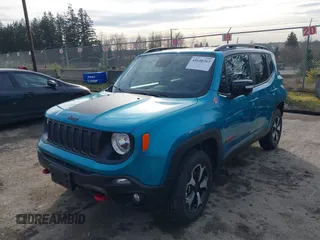 2022 Jeep Renegade Trailhawk with VIN ZACNJDC16NPN46704, listed as a IAAI auction lot 41648262 with 21,358 mi miles and . Bid and sale history available at DreamBid. Image 2.