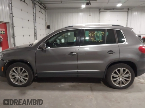2012 Volkswagen Tiguan S with VIN WVGBV7AX2CW002991, listed as a IAAI auction lot 42031877 with 205,979 mi miles and . Bid and sale history available at DreamBid. Image 14.