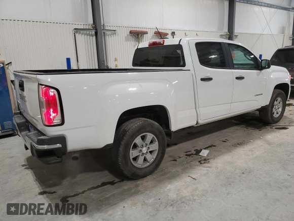 2015 GMC Canyon 2WD with VIN 1GTG5AE35F1172598, listed as a Copart auction lot 41620115 with 135,864 mi miles and Salvage Title. Bid and sale history available at DreamBid. Image 3.