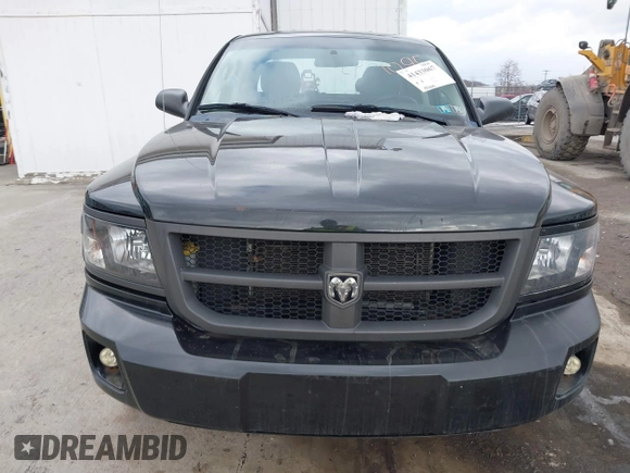 2011 Ram Dakota Bighorn/Lonestar with VIN 1D7RW3GK6BS611095, listed as a IAAI auction lot 41433067 with 137,638 mi miles. Bid and sale history available at carsss.com. Image 12.