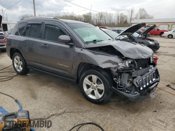 2014 Jeep Compass Latitude with VIN 1C4NJDEB4ED904731, listed as a Copart auction lot 51809165 with 104,760 mi miles and Salvage Title. Bid and sale history available at DreamBid. Image 4.