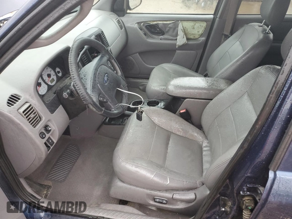 2002 Ford Escape XLT Choice with VIN 1FMYU04182KD34094, listed as a Copart auction lot 57299225 with 154,784 mi miles and Salvage title. Bid and sale history available at DreamBid. Image 7.