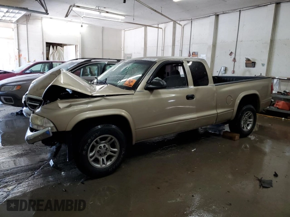 2003 Dodge Dakota SLT z VIN 1D7HL42N63S132141, wystawiony jako Copart lot #56138235 z przebiegiem 219 246 mil mil oraz Szkoda całkowita • Salvage title. Historia ofert i sprzedaży dostępna na DreamBid. Obrazek 1.