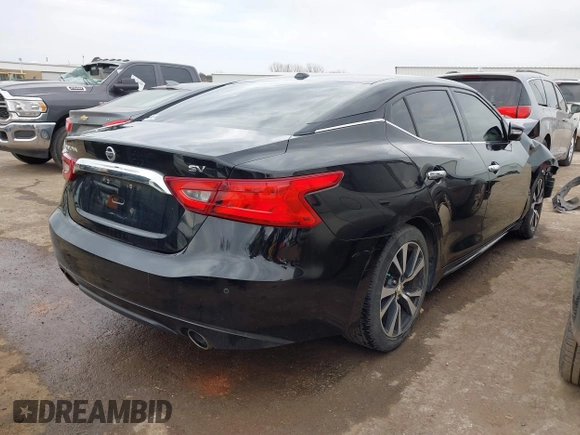 2018 Nissan Maxima S with VIN 1N4AA6AP7JC385580, listed as a IAAI auction lot 41748213 with 96,240 mi miles and . Bid and sale history available at DreamBid. Image 4.