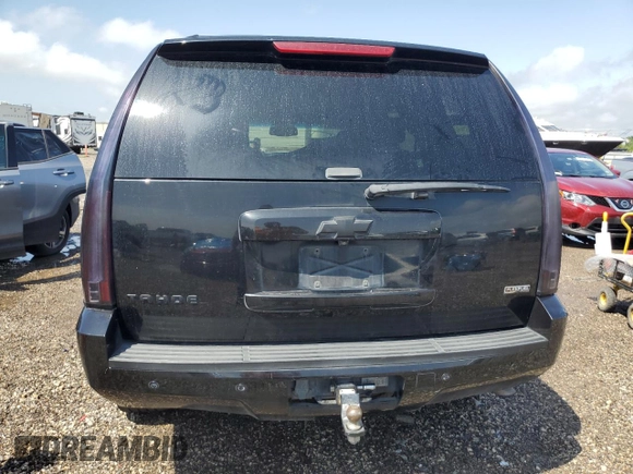 2009 Chevrolet Tahoe 2LT z VIN 1GNFC23019R284361, wystawiony jako Copart lot #56073585 z przebiegiem 306 320 mil mil oraz Szkoda całkowita • Salvage title. Historia ofert i sprzedaży dostępna na DreamBid. Obrazek 6.