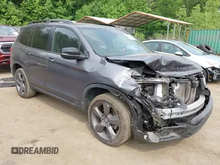 2020 Honda Passport Touring with VIN 5FNYF8H90LB020810, listed as a IAAI auction lot 42414880 with 69,450 mi miles and . Bid and sale history available at DreamBid. Image 1.