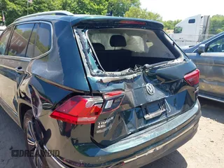 2018 Volkswagen Tiguan SEL with VIN 3VV2B7AX9JM058518, listed as a IAAI auction lot 42558129 with 82,807 mi miles and . Bid and sale history available at DreamBid. Image 6.