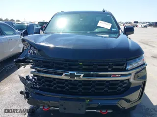 2021 Chevrolet Tahoe Z71 with VIN 1GNSKPKD2MR124128, listed as a IAAI auction lot 41874524 with 75,066 mi miles. Bid and sale history available at carsss.com. Image 13.