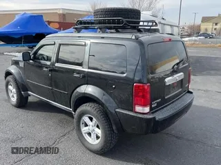 2008 Dodge Nitro SLT z VIN 1D8GU58K68W145253, wystawiony jako Copart lot #43768705 z przebiegiem 167 904 mil mil oraz Czysty tytuł • Clean title. Historia ofert i sprzedaży dostępna na DreamBid. Obrazek 3.