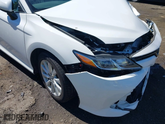 2019 Toyota Camry LE with VIN 4T1B11HK2KU187475, listed as a IAAI auction lot 42192293 with 44,413 mi miles and . Bid and sale history available at DreamBid. Image 18.
