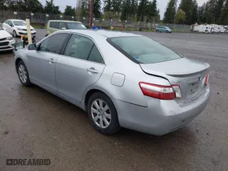 2007 Toyota Camry Hybrid with VIN JTNBB46K673021121, listed as a IAAI auction lot 41988725 with 266,907 mi miles. Bid and sale history available at carsss.com. Image 3.