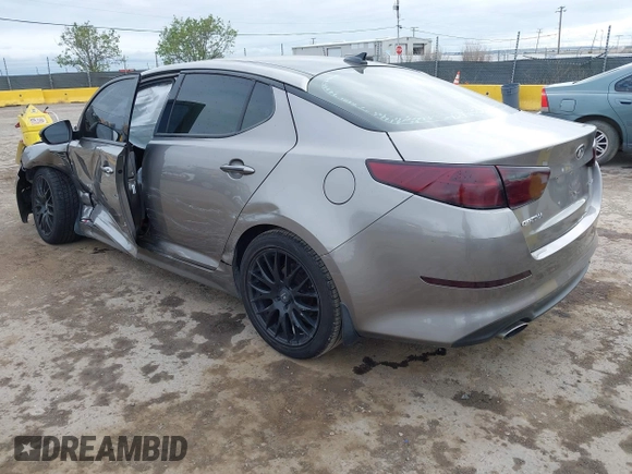 2015 Kia Optima EX with VIN 5XXGN4A7XFG423145, listed as a IAAI auction lot 42068943 with 113,730 mi miles and . Bid and sale history available at DreamBid. Image 3.