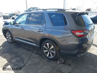 2025 Honda Pilot Touring with VIN 5FNYG2H73SB004351, listed as a IAAI auction lot 41699830 with 6,377 mi miles. Bid and sale history available at carsss.com. Image 3.