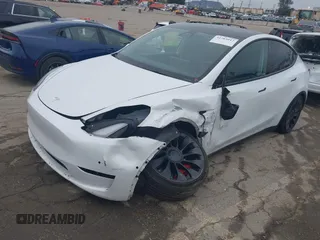 2022 Tesla Model Y Performance with VIN 7SAYGDEF0NF400560, listed as a IAAI auction lot 41783912 with 36,513 mi miles and . Bid and sale history available at DreamBid. Image 2.