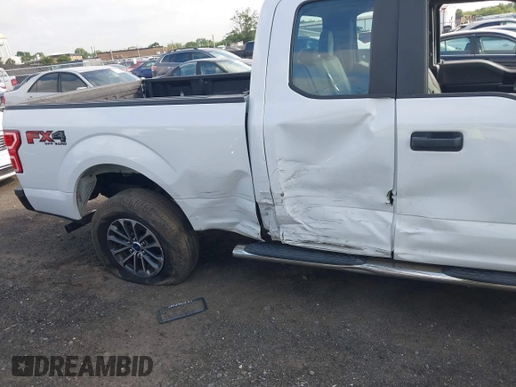 2018 Ford F-150 XL with VIN 1FTEX1EB0JFB32577, listed as a IAAI auction lot 42704857 with 147,359 mi miles and . Bid and sale history available at DreamBid. Image 6.