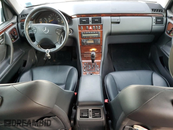 2002 Mercedes-Benz E-Class with VIN WDBJF82J32X066803, listed as a Copart auction lot 85474614 with 77,358 mi miles and Salvage Title. Bid and sale history available at carsss.com. Image 8.