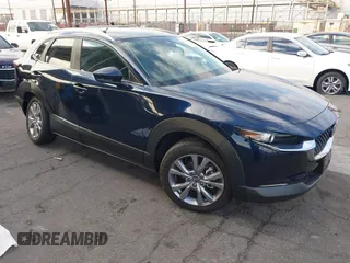 2023 Mazda CX-30 2.5 S Preferred Package with VIN 3MVDMBCM1PM587928, listed as a IAAI auction lot 41009388 with 9,590 mi miles. Bid and sale history available at carsss.com. Image 1.