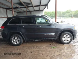 2014 Jeep Grand Cherokee Laredo with VIN 1C4RJEAG6EC206748, listed as a IAAI auction lot 42244421 with 198,217 mi miles and . Bid and sale history available at DreamBid. Image 13.