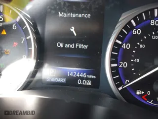 2014 Infiniti Q50 with VIN JN1BV7AP4EM677506, listed as a IAAI auction lot 40113207 with 142,446 mi miles. Bid and sale history available at carsss.com. Image 7.