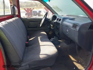 1997 Nissan Trucks 2WD XE with VIN 1N6SD11S7VC381268, listed as a IAAI auction lot 41957657 with 215,483 mi miles. Bid and sale history available at carsss.com. Image 5.