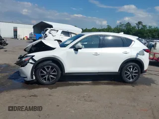 2018 Mazda CX-5 Grand Touring с VIN JM3KFBDM4J0414925, выставлен на аукционе IAAI как лот 42212109 с пробегом 86 826 миль миль и . История ставок и продаж доступна на DreamBid. Изображение 14.