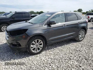 2019 Ford Edge Titanium с VIN 2FMPK3K90KBB42545, выставлен на аукционе Copart как лот 60873705 с пробегом 88 913 миль миль и Списание • Salvage title. История ставок и продаж доступна на DreamBid. Изображение 1.