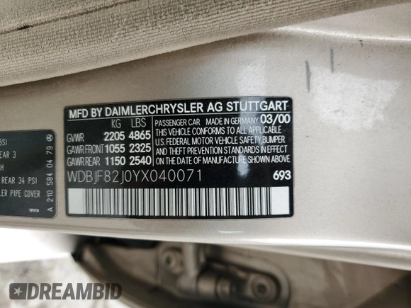 2000 Mercedes-Benz E-Class with VIN WDBJF82J0YX040071, listed as a Copart auction lot 50001165 with 145,638 mi miles and Salvage Title. Bid and sale history available at carsss.com. Image 12.