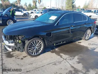 2019 BMW 5 Series 530e iPerformance with VIN WBAJA9C56KB398686, listed as a IAAI auction lot 41507090 with 64,395 mi miles. Bid and sale history available at carsss.com. Image 21.