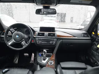 2013 BMW 3 Series 335i xDrive with VIN WBA3B9C54DF586608, listed as a IAAI auction lot 41933738 with 133,423 mi miles. Bid and sale history available at carsss.com. Image 5.