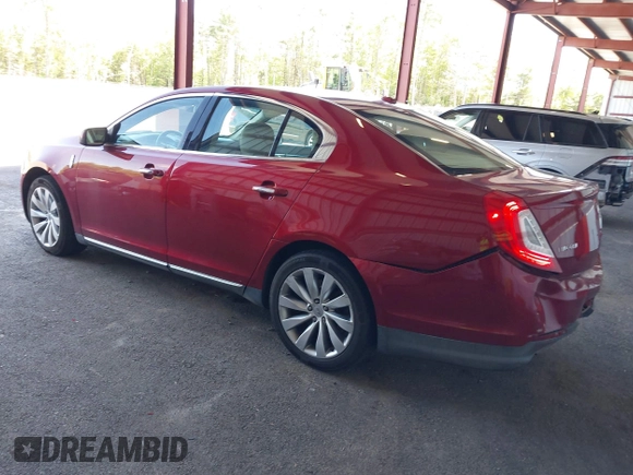 2014 Lincoln MKS z VIN 1LNHL9DK0EG606497, wystawiony jako IAAI lot #42279603 z przebiegiem 129 972 mil mil oraz . Historia ofert i sprzedaży dostępna na DreamBid. Obrazek 3.