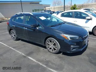 2018 Subaru Impreza Limited with VIN 4S3GTAT63J3716421, listed as a IAAI auction lot 41818288 with 51,320 mi miles. Bid and sale history available at carsss.com. Image 1.