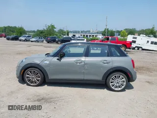 2019 MINI Hardtop 4 Door Cooper S with VIN WMWXU3C57K2H54547, listed as a IAAI auction lot 42492037 with 74,657 mi miles and . Bid and sale history available at DreamBid. Image 15.