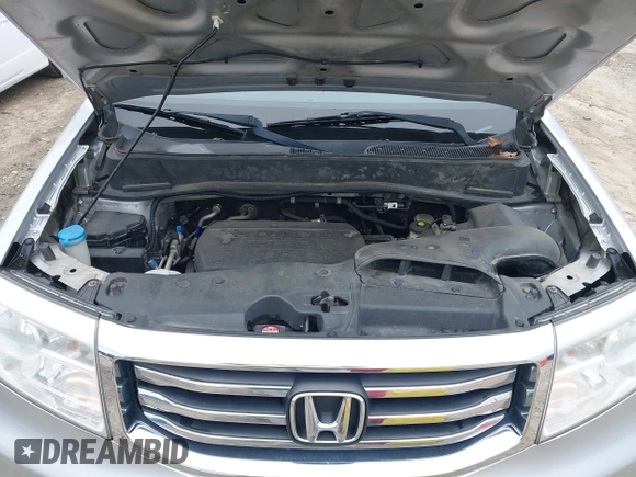 2014 Honda Pilot Touring with VIN 5FNYF4H91EB011934, listed as a IAAI auction lot 41929415 with 227,343 mi miles and . Bid and sale history available at DreamBid. Image 10.