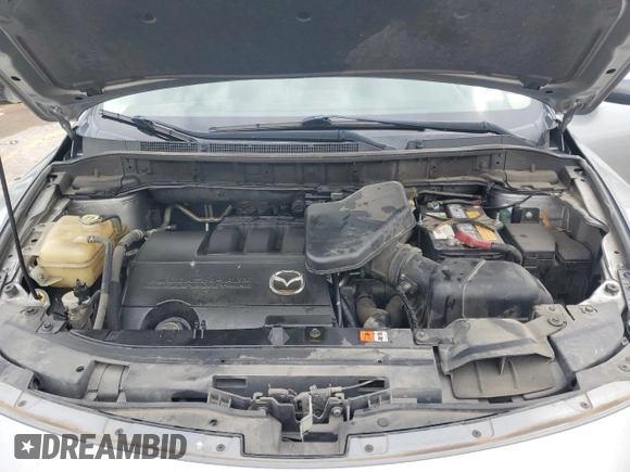 2014 Mazda CX-9 Touring с VIN JM3TB2CA2E0431879, выставлен на аукционе Copart как лот 64778845 с пробегом 145 476 миль миль и Чистый • Clean title. История ставок и продаж доступна на DreamBid. Изображение 12.
