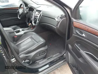2016 Cadillac SRX Luxury Collection z VIN 3GYFNBE32GS577023, wystawiony jako IAAI lot #42374130 z przebiegiem 132 671 mil mil oraz . Historia ofert i sprzedaży dostępna na DreamBid. Obrazek 5.