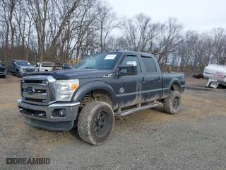 2015 Ford Super Duty F-250 SRW Lariat with VIN 1FT7W2BT5FEB50696, listed as a IAAI auction lot 41406626 with 106,993 mi miles. Bid and sale history available at carsss.com. Image 2.
