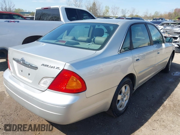 2002 Toyota Avalon XL with VIN 4T1BF28B52U265710, listed as a IAAI auction lot 42102300 with 99,901 mi miles and . Bid and sale history available at DreamBid. Image 4.