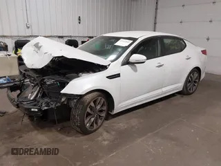 2015 Kia Optima SX with VIN 5XXGR4A74FG487895, listed as a IAAI auction lot 42111045 with 109,442 mi miles and . Bid and sale history available at DreamBid. Image 2.