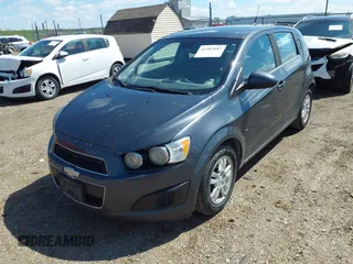 2013 Chevrolet Sonic LT with VIN 1G1JC6SH8D4135428, listed as a IAAI auction lot 41983682 with 255,918 mi miles. Bid and sale history available at carsss.com. Image 2.