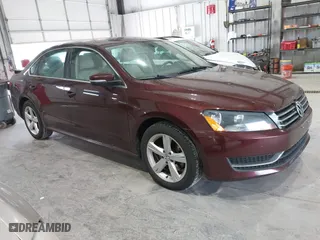 2014 Volkswagen Passat SE w/Sunroof with VIN 1VWBS7A39EC070670, listed as a IAAI auction lot 41885127 with 174,257 mi miles. Bid and sale history available at carsss.com. Image 1.