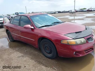 2003 Pontiac Bonneville SE with VIN 1G2HX52K334138157, listed as a IAAI auction lot 41897767 with 216,757 mi miles. Bid and sale history available at carsss.com. Image 6.