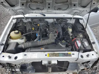 2005 Ford Ranger XL with VIN 1FTYR10D05PB10515, listed as a Copart auction lot 54553865 with 213,057 mi miles and Salvage title. Bid and sale history available at DreamBid. Image 11.