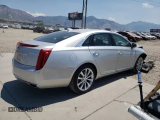 2016 Cadillac XTS Luxury Collection with VIN 2G61N5S35G9197325, listed as a Copart auction lot 55613225 with 131,404 mi miles and Salvage title. Bid and sale history available at DreamBid. Image 3.