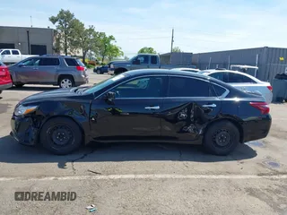 2018 Nissan Altima S with VIN 1N4AL3AP9JC191111, listed as a IAAI auction lot 42104769 with 84,914 mi miles and . Bid and sale history available at DreamBid. Image 14.