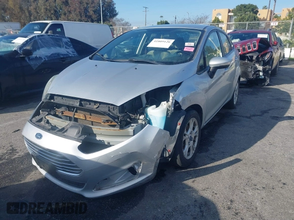 2016 Ford Fiesta SE with VIN 3FADP4BJ6GM205412, listed as a IAAI auction lot 41809126 with 100,941 mi miles. Bid and sale history available at carsss.com. Image 2.