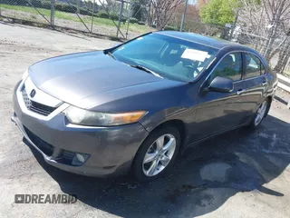 2009 Acura TSX with VIN JH4CU26659C027813, listed as a IAAI auction lot 41848415 with 216,257 mi miles. Bid and sale history available at carsss.com. Image 2.